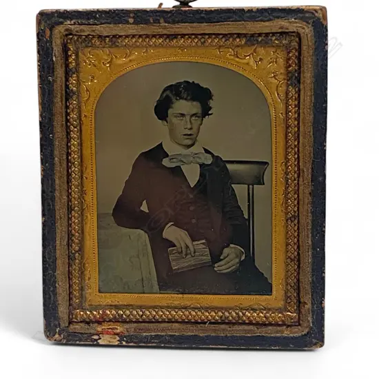 Leather covered framed ambrotype - youth with book,